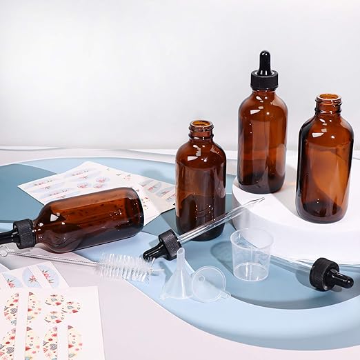 12 Pack 4oz Amber Glass Bottles with Glass Eye Droppers for Essential Oils, Perfumes & Lab Chemicals (1 Brush, 2 Funnels, 2 Extra Droppers, 24 Pieces Labels & 30ml Measuring Cup Included)